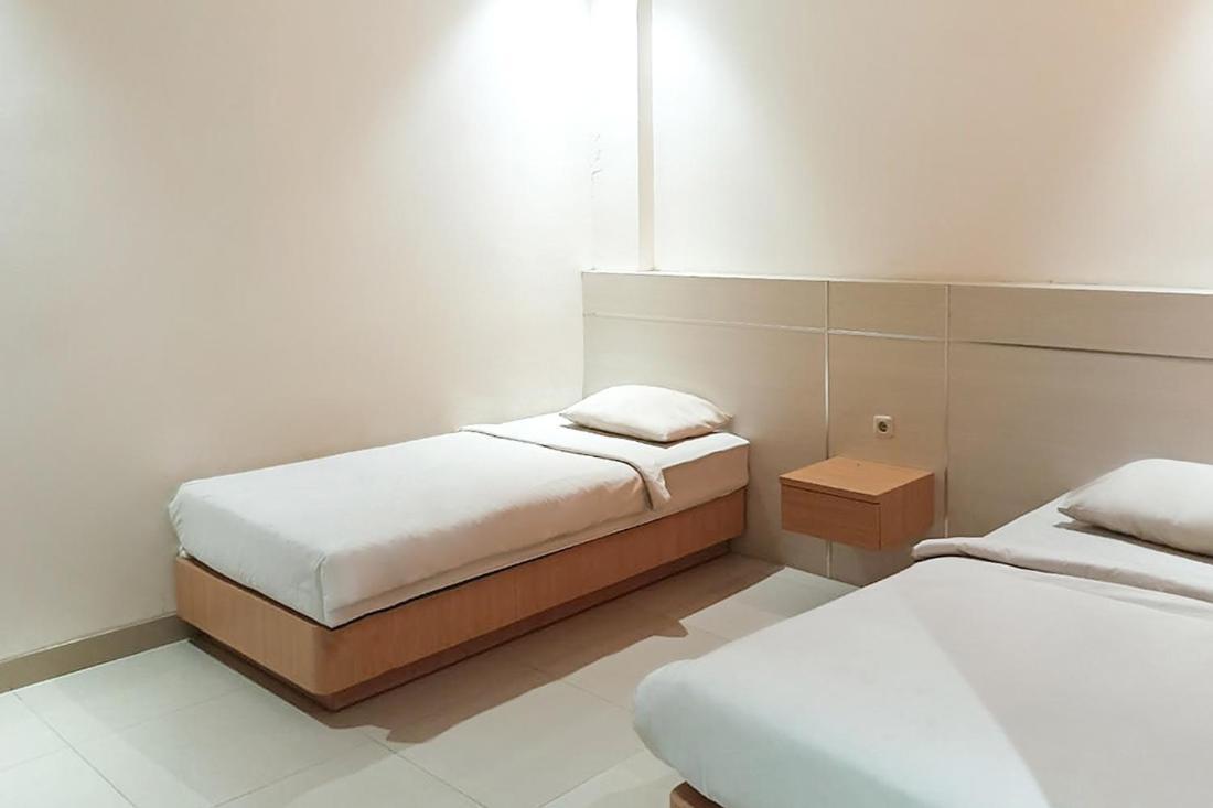 Twospaces Living At Kr Hotel Palembang Esterno foto
